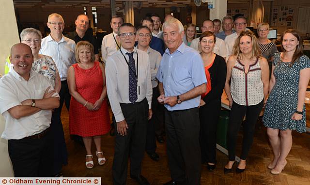 FOND farewell . . . Vincent (centre, right) with colleagues on his last day at the Chronicle