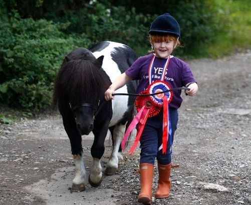 AIMEE Nield, aged six, with Elvis, the prize-winning Shetland pony
