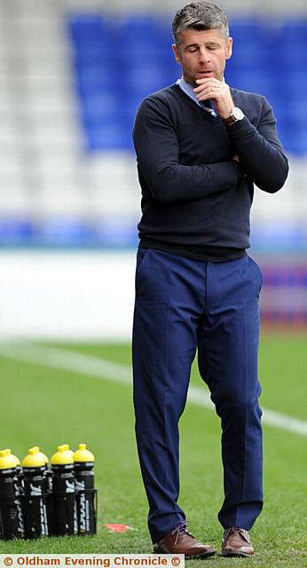 I CAN'T LOOK . . . Athletic boss Stephen Robinson during Saturday's woeful display against Swindon Town.