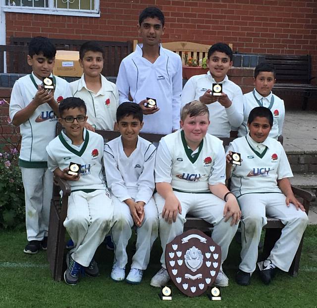 BIG SMILES . . . Glodwick's champion under-11s team, the winners of the Lancashire Cup