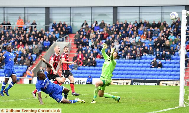 SO CLOSE . . . Freddie Ladapo (grounded) hits the crossbar late on in Saturday's game with Latics trailing 3-2. PICTURE by ALAN HOWARTH
