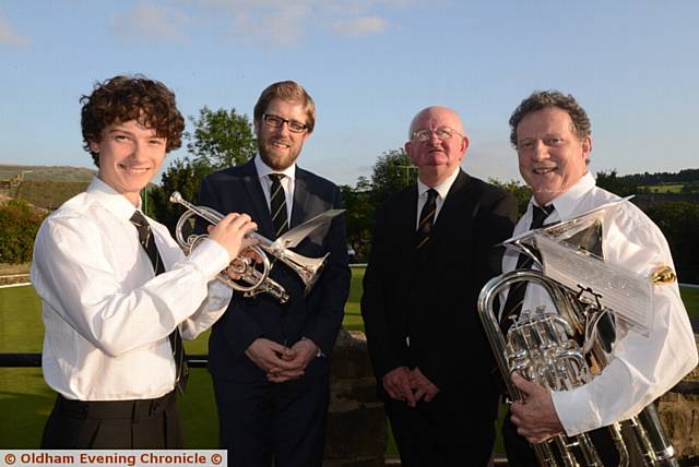 Wellington Brass Band, from New Zealand make a guest appearance at Dobcross Band Club to compensate for missing the Whit Friday Band contest. They are in Britain to take part in the 164th British Open Brass Band Championships in Birmingham at the weekend. Left to right, Kip Cleverley, David Bremner (musical director), John Holden (Dobcross Club president), Riki McDonnell.
