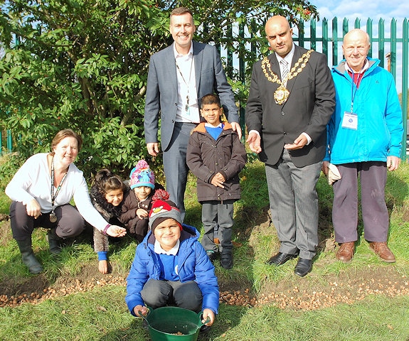 Mrs Nuttall, Mr Taylor, Mayor of Oldham Sadab Quimer, Rotarian Ray Coverley and children from Coppice Primary Academy