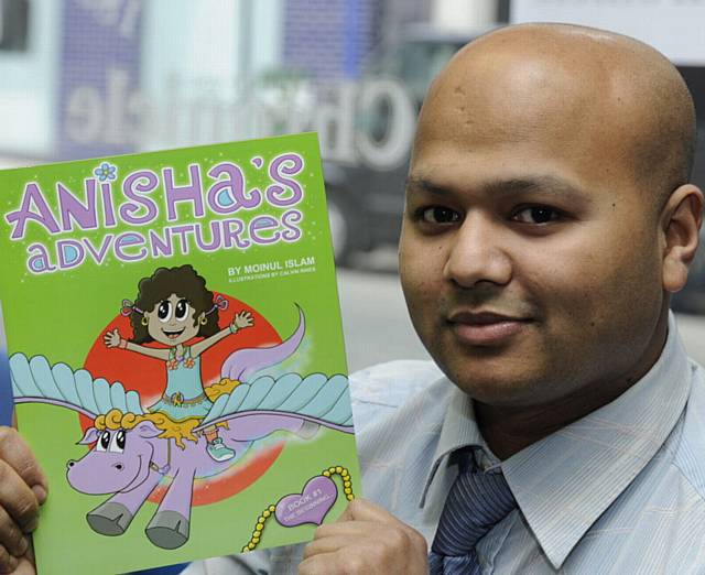 DAD Moinul with his book, Anisha's Adventures