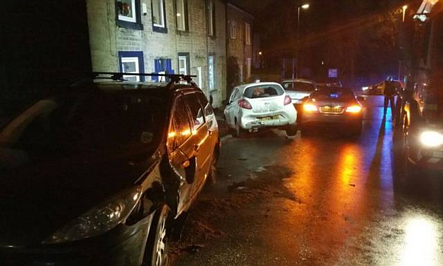 DAMAGED . . . the vehicle ploughed into seven parked cars