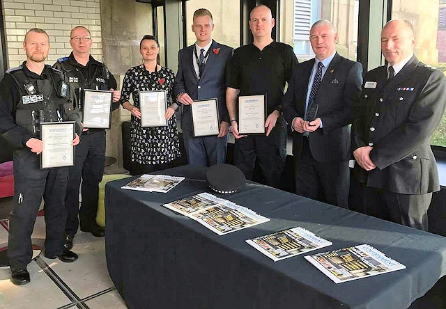 GMP officers receive certificates in recognition of their actions during the flooding in 2016