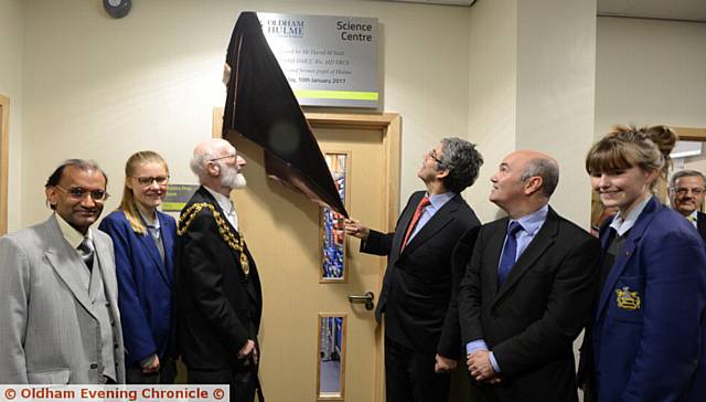 OPENING ceremony . . . Mr Nott unveils the plaque watched by, from left, Vijay Srivastava (chairman of governors), Daisy Hilton, Oldham mayor Councillor Derek Heffernan, David Nott, Craig Mairs (principal) and Mia Robinson