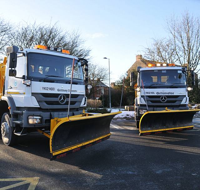 READY for action . . . two of Oldham's gritters