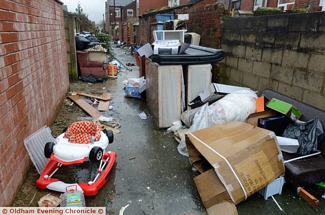 Fly tipping in alley behind Belgrave Road, Hathershaw.