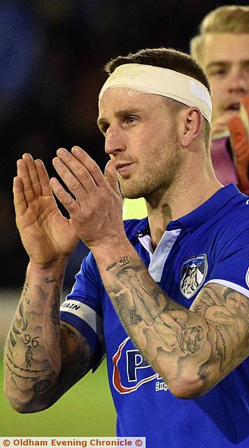 Peter Clarke applauding the fans after the Gillingham match