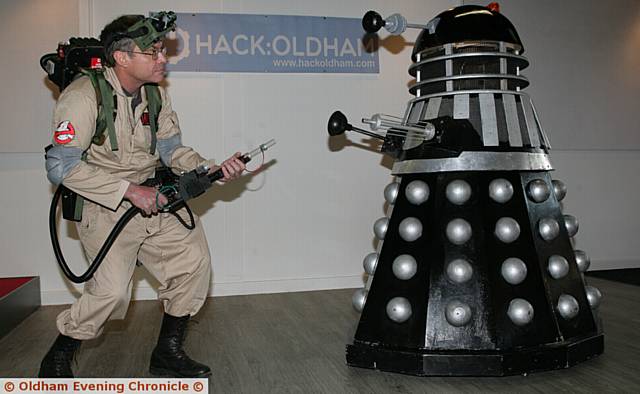 STAND-OFF . . . Volunteer ghostbuster Tony Goacher takes on a Dalek at the Digital Enterprise Hub pop-up event