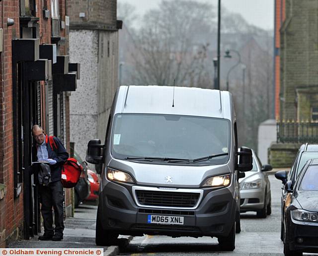 MESSAGE not being delivered . . . this van narrowly avoids a postman on Retiro Street