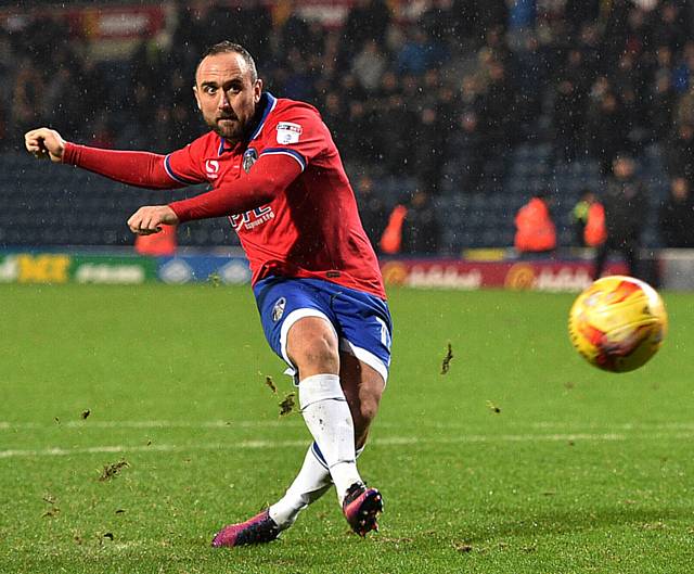 ON THE SPOT: Lee Croft scores the winning penalty at Ewood Park