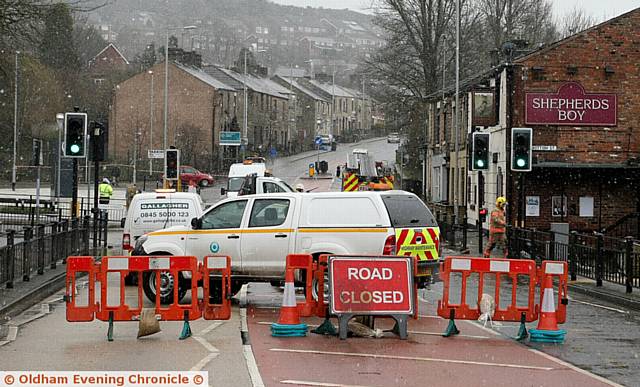 NO way through . . .

 Huddersfield Road was closed in both directions following the burst