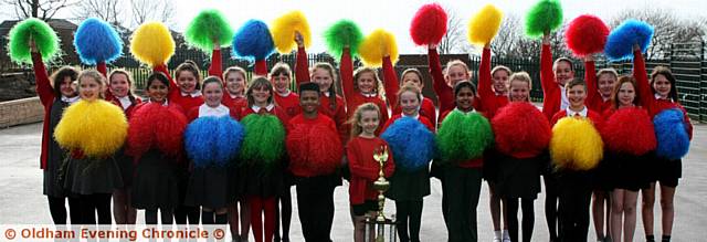 WINNERS... Knowsley primary school, Oldham, won first prize in the cheerleading festival. Pictured with the trophy is Lily Brophy, aged nine