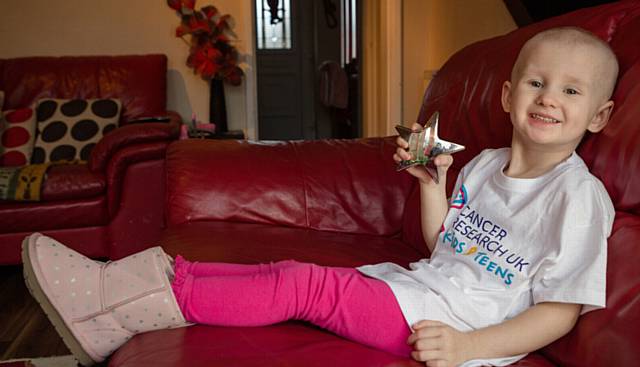 Harlie Hepburn was awarded a Cancer Research UK Kids and Teens Star Award to honour her bravery