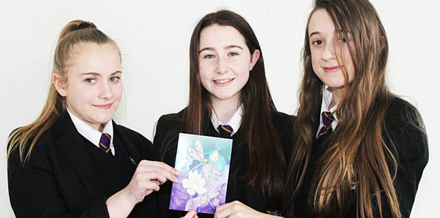 QUICK-THINKERS . . . Oldham Academy North pupils (left to right) Heather Hayes, Bethan Jones, Olivia Newcombe with a letter of thanks from a woman they helped in Royton Park
