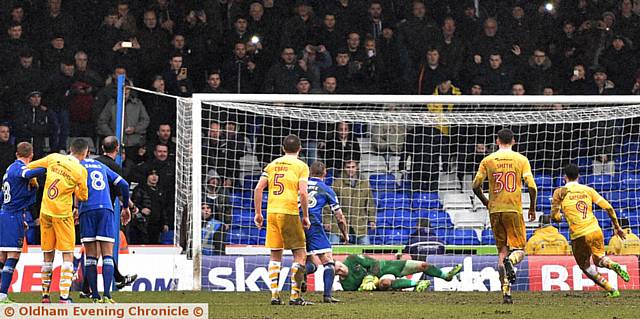 GREAT GLOVEWORK . . . Connor Ripley gets down low to pounce on Lee Gregory's first penalty