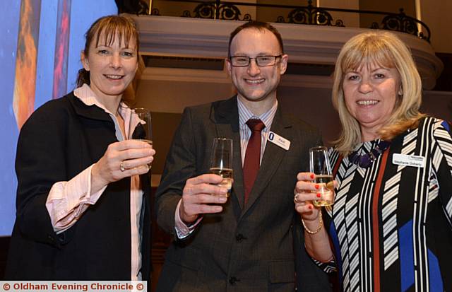 RAISING a glass . . . cinema manager Paul Dagg with sponsors Helan Graham and Stephanie Doherty