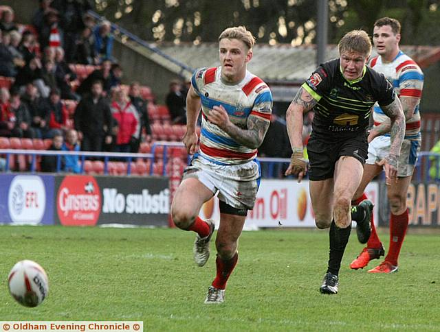ON THE MARK . . . George Tyson (right) was one of five Oldham try-scorers against Dewsbury