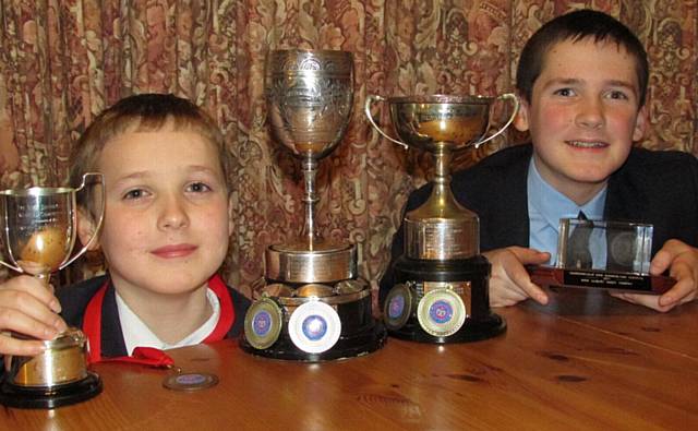 WINNERS . . . Brothers James and Sam Fitzsimons with their trophies