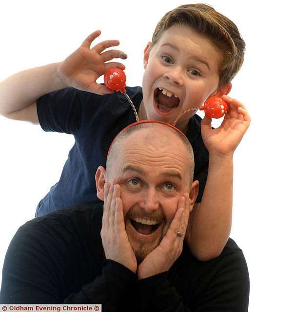 READY . . . Finlay Mellor gets in the mood for his Comic Relief charity run with his dad Barry