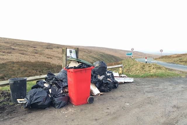 RUBBISH piled in the Marsden Moor Heritage trail car park lay-by on the A640 above Denshaw

