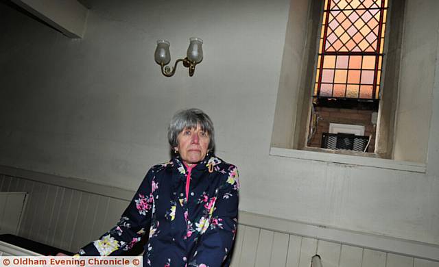 FOOD thefts . . . Judith Haughton, treasurer at United Reformed Church on Union Street, by the smashed window