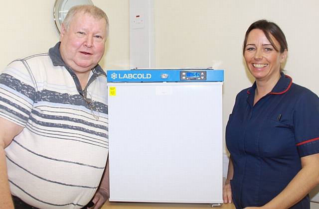 THAT'S cool . . . Vicki Elcock with John Bispham who donated £450 for a fridge to store antibiotics at Butler Green Enhanced Intermediate Care Centre