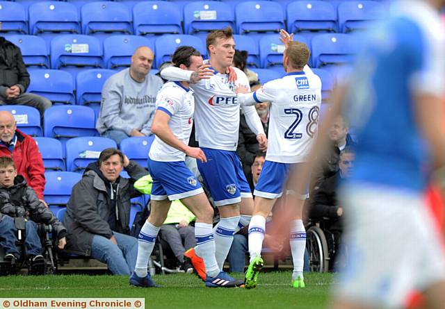 THAT'LL DO NICELY . . . Lee Erwin celebrates his goal at Peterborough last weekend
