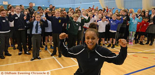 INSPIRING . . . Olympic boxer Natasha Jonas with pupils at the Primary School Health Champions launch