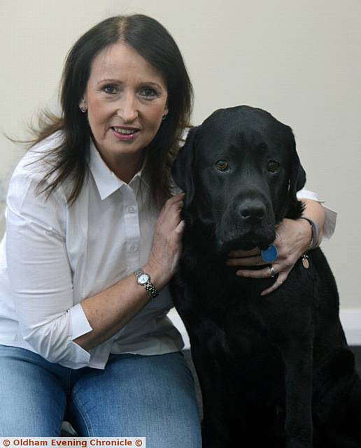 GILL Nuttall with her dog Jack, a black labrador blood donor 