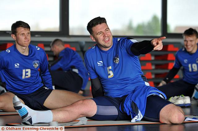 Oldham Athletic players in yoga session at GloGym in North Stand