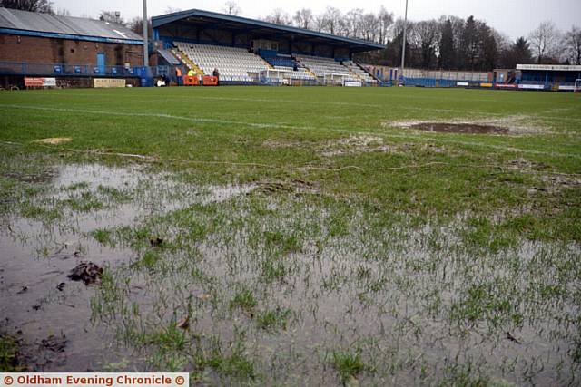 NO PLAY TODAY . . . a waterlogged pitch at Bower Fold left match officials with no choice but to call off yesterday's clash between Oldham and Dewsbury Rams in the Kingstone Press Championship. 
