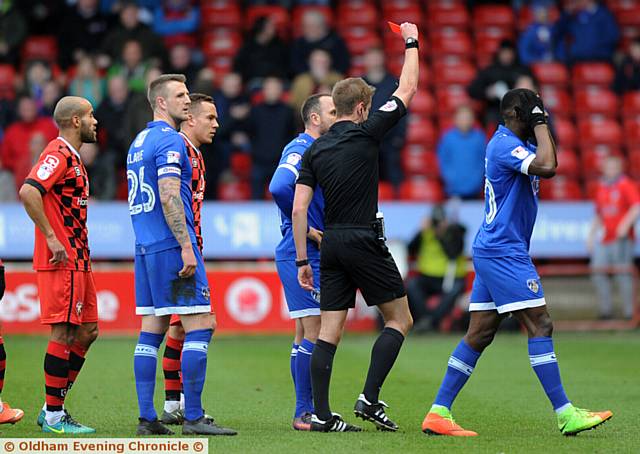 OFF . . . Lee Croft (partially hidden) receives his marching orders from referee John Brooks. 
