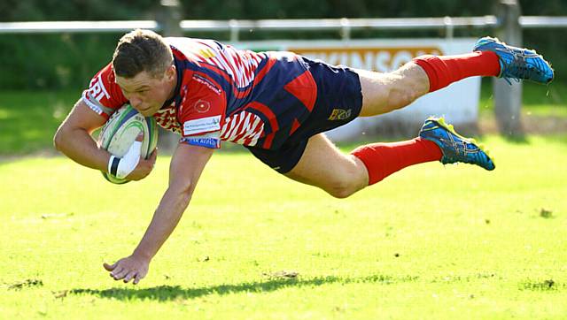 WILL MELLOR . . . hat-trick of tries at Workington