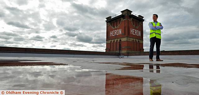 UP on the roof . . .  Craig Holden (group HR director) at Heron Mill which will be used as a distribution warehouse