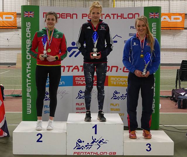 NUMBER ONE . . . Olivia Green (centre) tops the podium