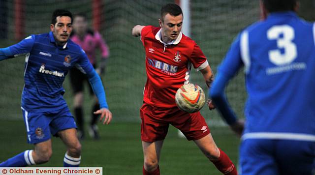 ON TARGET . . . Jack Tuohy brings the ball under control against St Helens Town last night