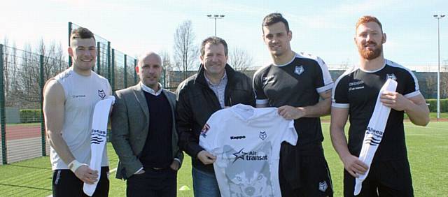 Terry Churchill, chief operating officer of Allseas Global Logistics ; Martin Vickers, business development officer at Toronto Wolfpack, and Bryn Atherton, sales manager of Allseas Global Logistics, with players. 