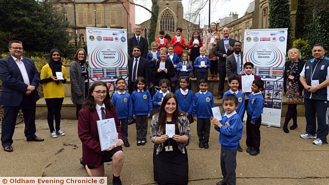 SIGNED UP . . . Representatives from some of the schools and organisations which have signed up to the pledge. Front (from left) Madison Kelly (Hathershaw College) Suzy Ashworth and Taha Mehmood (Coppice Primary Academy)