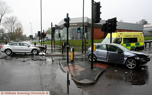 RTA at the traffic lights on St Marys Way with the junction of Rochdale road, Oldham, between a grey Vauxhall Astra and a silver Citroen C5.