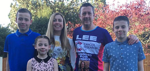RUNNER . . . Lee Doherty, with wife Emma and children Joshua, Megan and Rhys, who is taking part in the London Marathon in memory of his sister Wendy Clarke 
