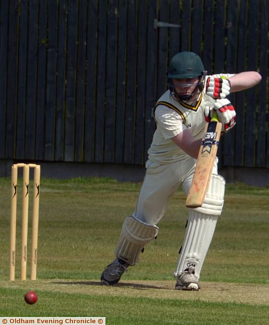 PLAYING TO THE OFFSIDE . . . Saddleworth's Dan Poole pushes the ball into the covers against Heyside.

