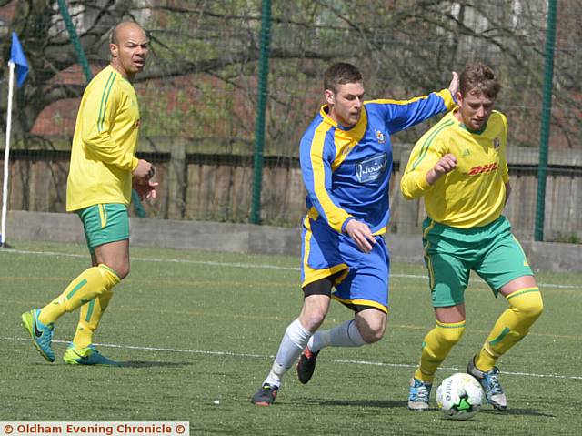 ON THE RUN . . . Royton Town's Grant Riley in action against Rochdale Sacred Heart