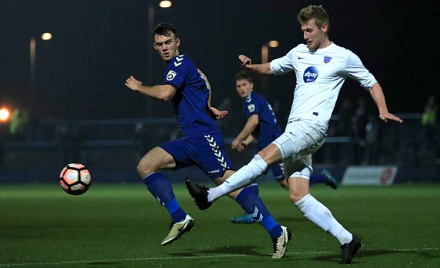 JAMIE Stott (left), in action for Curzon Ashton in this season's FA Cup, has been recalled by Athletic after impressing on the non-league scene