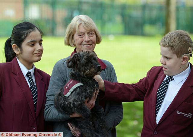 HEARING dog Sian and Eileen Hosie meet deaf pupils Khiza Rehman and Joshua Wild