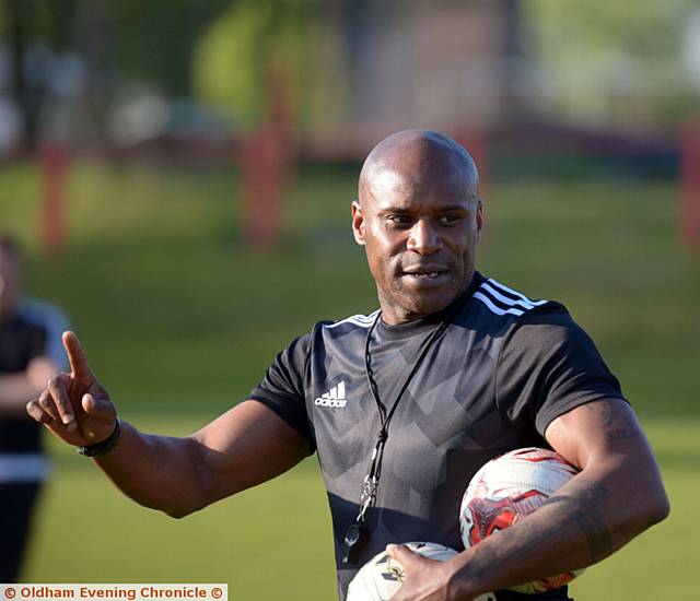 POINTING THE WAY . . . ex-Chelsea star Frank Sinclair took training at Clayton fields