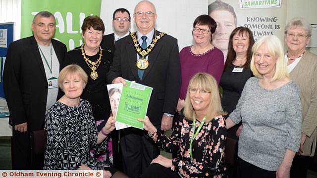 Rochdale, Oldham and District Samaritans, celebrate their golden anniversary with the Mayor and Mayoress of Rochdale, Councillor Ray Dutton and his wife Elaine, with (left front) Samaritans director Janet Murphy and (right front) Samaritans deputy director Jean Casey and other volunteers and guests