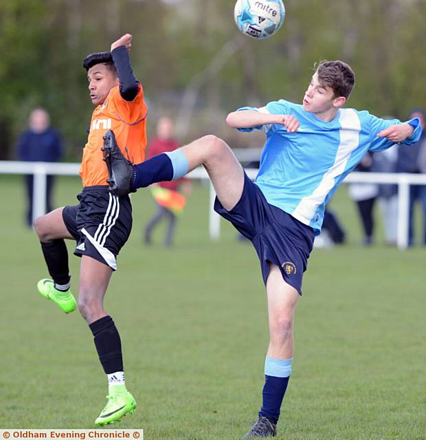 WATCH OUT: Year 11s Jamil Ahmad (Blue Coat, orange shirt) takes on Harrison Weiner, from North Chadderton